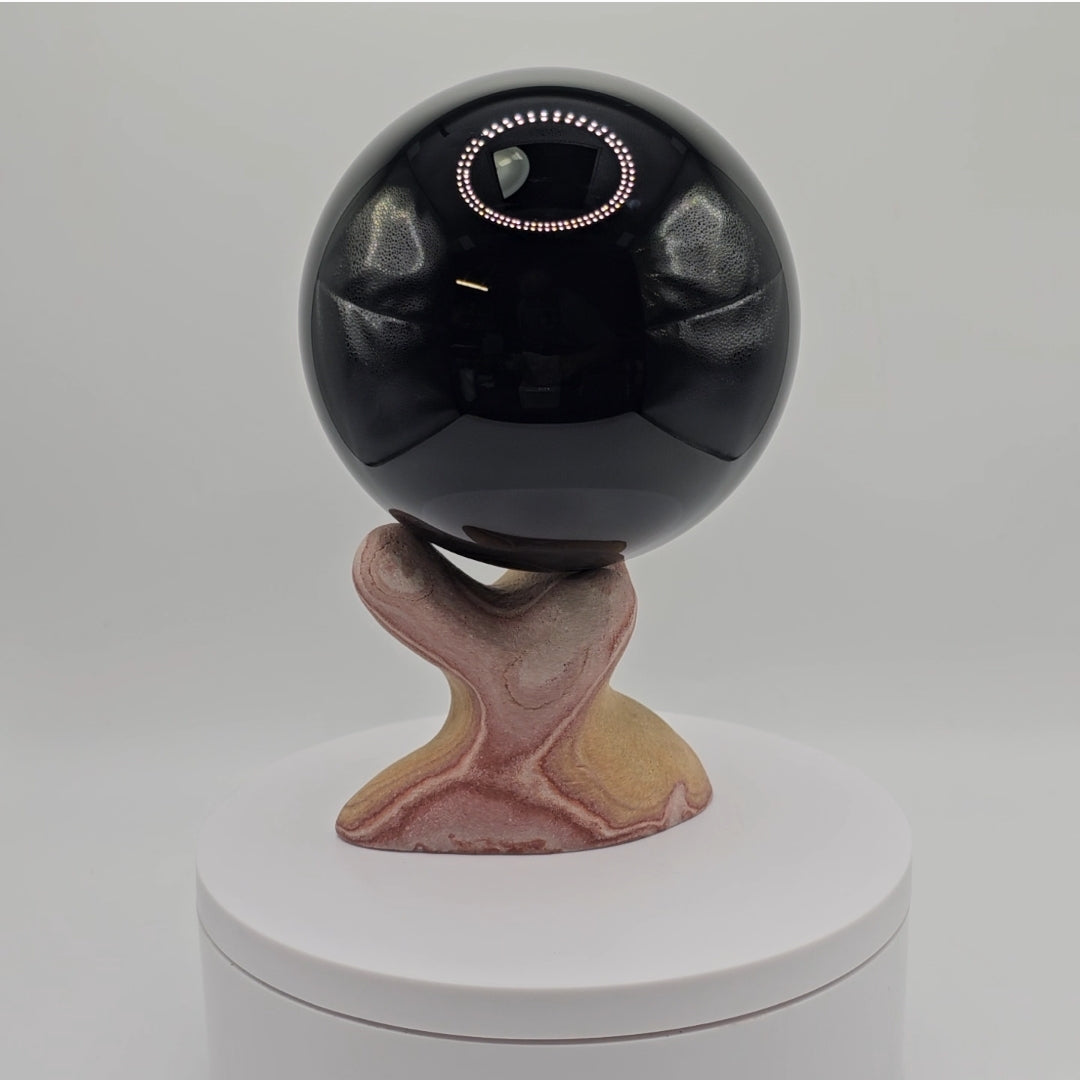 Handcarved sphere stand