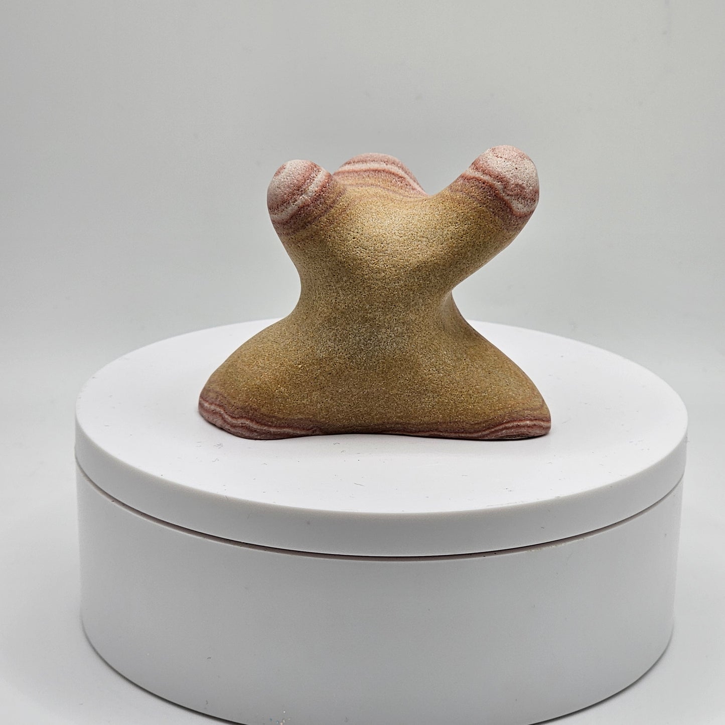 Handcarved sphere stand