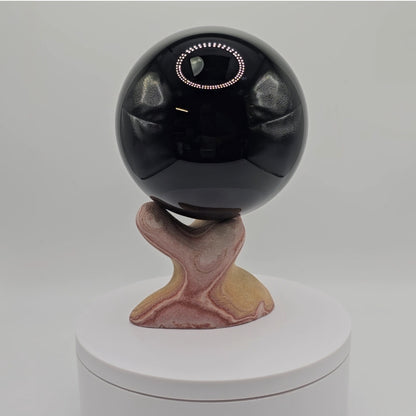 Handcarved sphere stand
